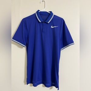 Blue Nike polo. Size medium